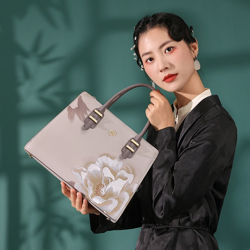 古伊西 新中式时尚潮流高级感 牛剖层皮革 手提斜挎包 女款