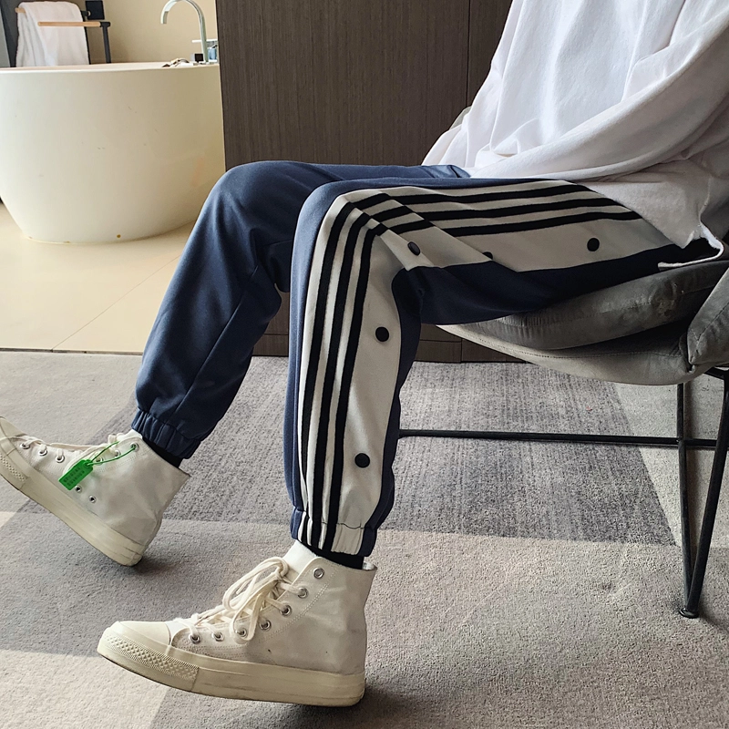 么宁 侧边条纹纽扣装饰设计感舒适透气潮流时尚简约百搭个性痞帅束脚休闲裤 男女同款