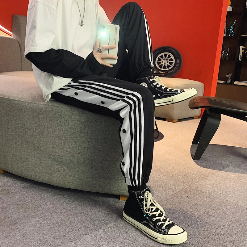 么宁 侧边条纹纽扣装饰设计感舒适透气潮流时尚简约百搭个性痞帅束脚休闲裤 男女同款