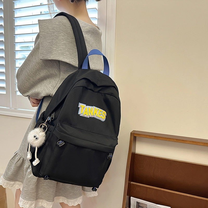 木木兔 轻便减压书包女高中生大容量减负初中小学生  经典时尚小众设计 高级感 休闲拉链开合  牛津纺 双肩包 常规 黑色