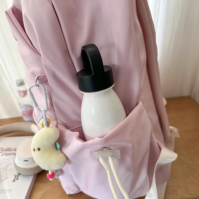 木木兔 超大容量书包女初中生减负高中生 小学生轻便背包 经典时尚小众设计 高级感 休闲拉链开合  尼龙布 双肩包 常规 米白色