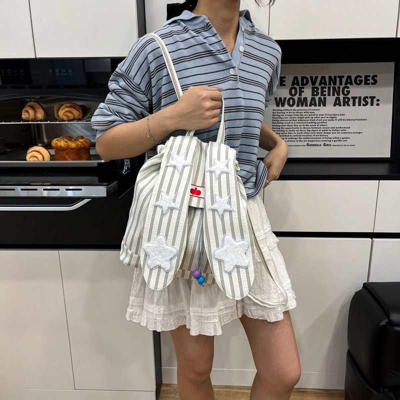 木木兔 书包女高中学生超大容量初中生小轻便  经典时尚小众设计 高级感 休闲拉链开合 尼龙布 双肩包 常规 蓝色