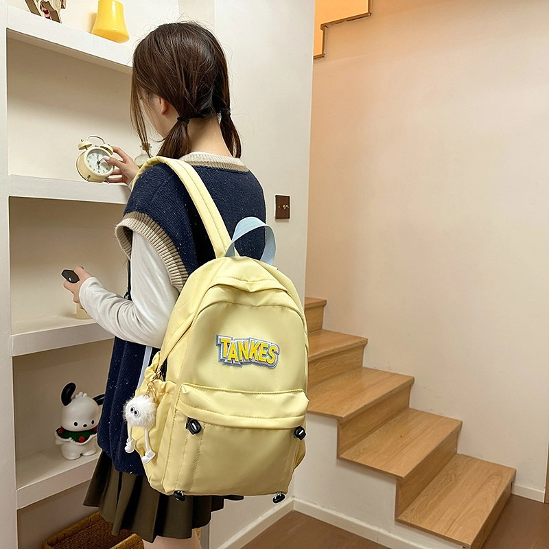 木木兔 轻便减压书包女高中生大容量减负初中小学生  经典时尚小众设计 高级感 休闲拉链开合  牛津纺 双肩包 常规 黑色