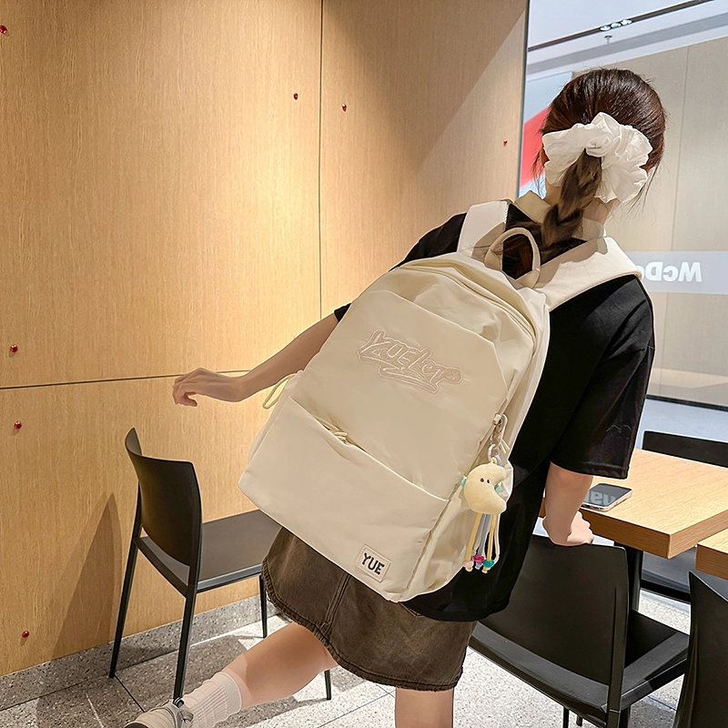木木兔 超大容量书包女初中生减负高中生 小学生轻便背包 经典时尚小众设计 高级感 休闲拉链开合  尼龙布 双肩包 常规 米白色