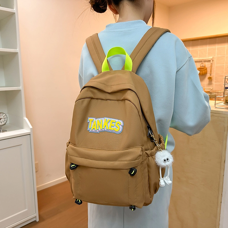 木木兔 轻便减压书包女高中生大容量减负初中小学生  经典时尚小众设计 高级感 休闲拉链开合  牛津纺 双肩包 常规 黑色
