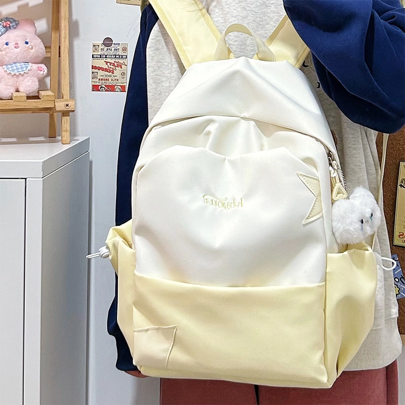 木木兔 书包女生初中生超大容量中学生高中小学生轻便减负  经典时尚小众设计 高级感 休闲拉链开合 尼龙布 双肩包 常规 黄色