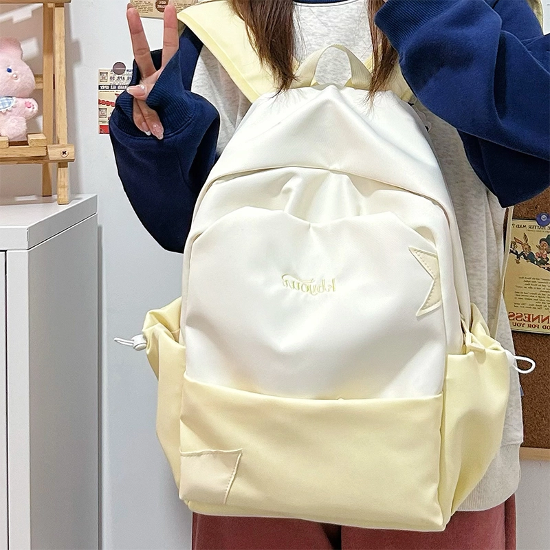 木木兔 书包女生初中生超大容量中学生高中小学生轻便减负  经典时尚小众设计 高级感 休闲拉链开合 尼龙布 双肩包 常规 黄色