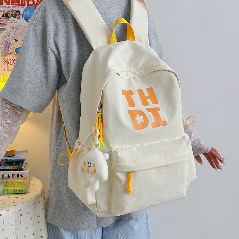 木木兔 书包女生初中生超大容量中学生高中小学生轻便减负  经典时尚小众设计 高级感 休闲拉链开合 尼龙布 双肩包 常规 卡其色