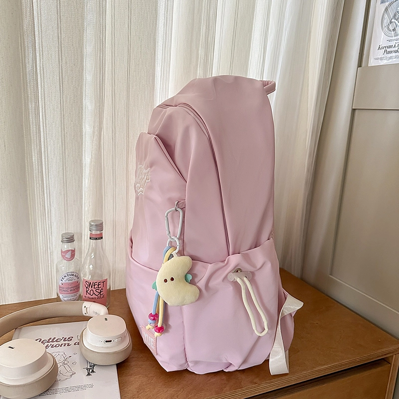 木木兔 超大容量书包女初中生减负高中生 小学生轻便背包 经典时尚小众设计 高级感 休闲拉链开合  尼龙布 双肩包 常规 米白色