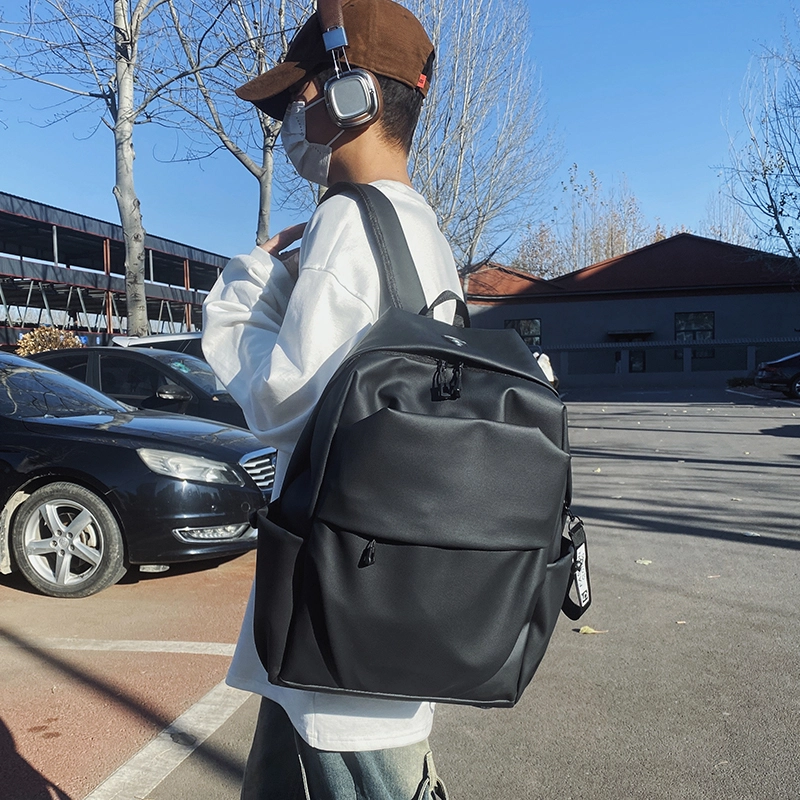 普乐威 韩版简约学生书包褶皱通勤旅行电脑 防水面料 背包双肩包 男女同款情侣款 灰色/黑色