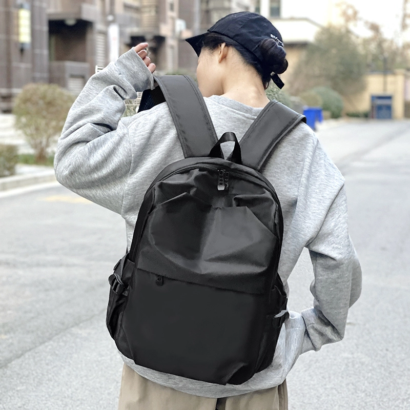 普乐威 韩版潮流时尚休闲百搭防水旅行通勤高中初中大学生书包电脑包背包 复合布 双肩包 常规 男女同款情侣款 黑色/灰色