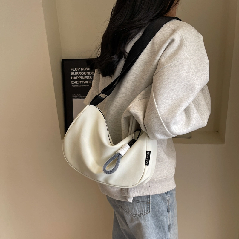 普乐威 高颜值简约时尚百搭小众通勤 布 单肩包 男女同款情侣款 白蓝/白黑/黑色