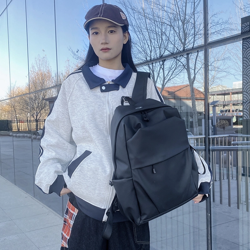 普乐威 韩版简约学生书包褶皱通勤旅行电脑 防水面料 背包双肩包 男女同款情侣款 灰色/黑色
