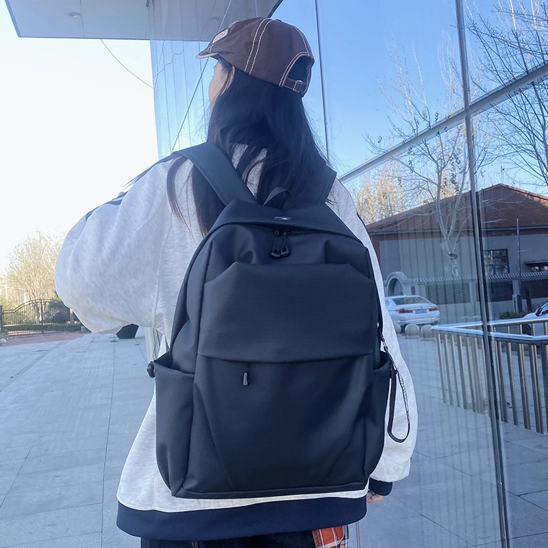 普乐威 韩版简约学生书包褶皱通勤旅行电脑 防水面料 背包双肩包 男女同款情侣款 灰色/黑色