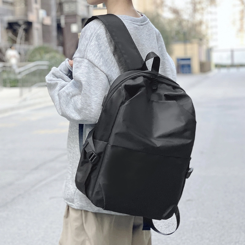 普乐威 韩版潮流时尚休闲百搭防水旅行通勤高中初中大学生书包电脑包背包 复合布 双肩包 常规 男女同款情侣款 黑色/灰色