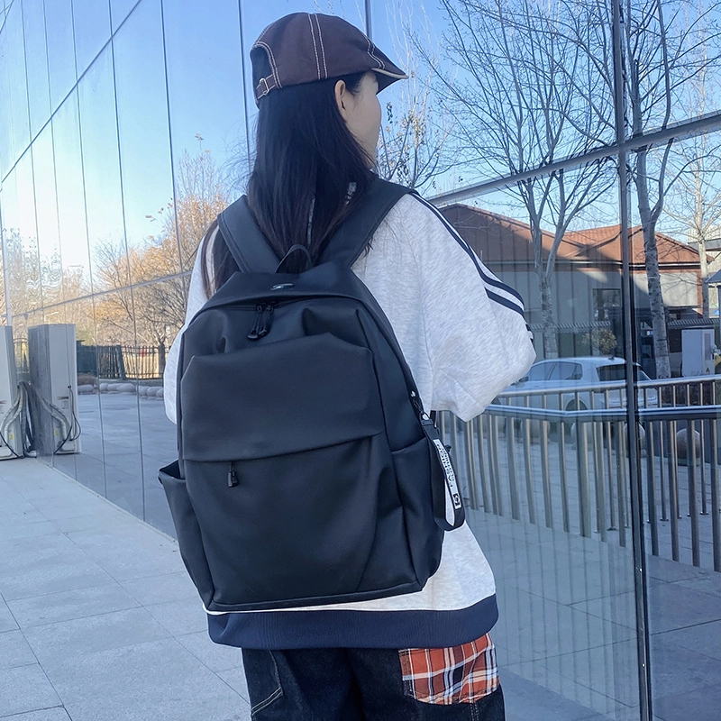 普乐威 韩版简约学生书包褶皱通勤旅行电脑 防水面料 背包双肩包 男女同款情侣款 灰色/黑色