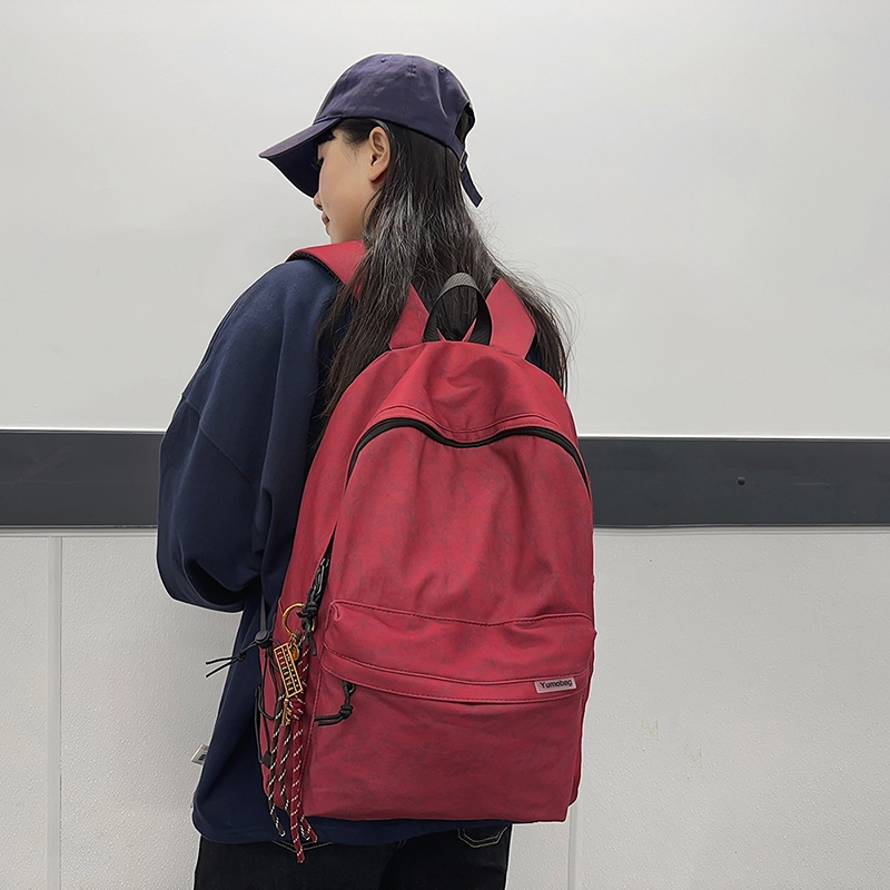 普乐威 韩系高颜值书包学生简约时尚潮流通勤旅游 尼龙 背包双肩包 男女同款情侣款 黑色/酒红色/绿色/米色