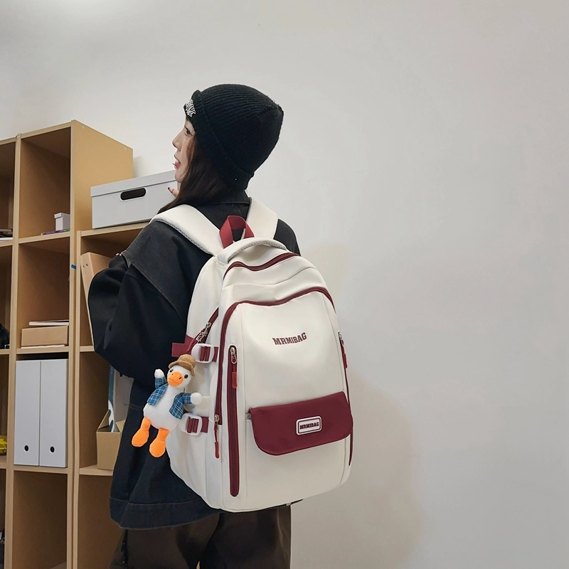 行途 韩版时尚大容量港风休闲小标校园学生 书包背包双肩包 尼龙 男女同款情侣款 多色