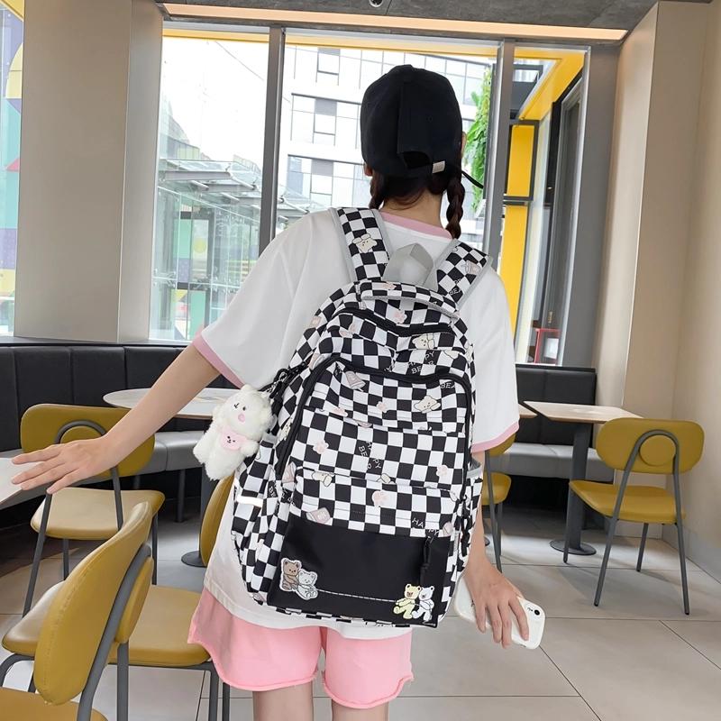 行途 学院风书包时尚格子简约背包大容量初中生休闲百搭双肩包女 尼龙