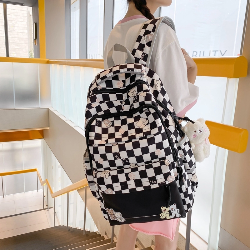 行途 学院风书包时尚格子简约背包大容量初中生休闲百搭双肩包女 尼龙