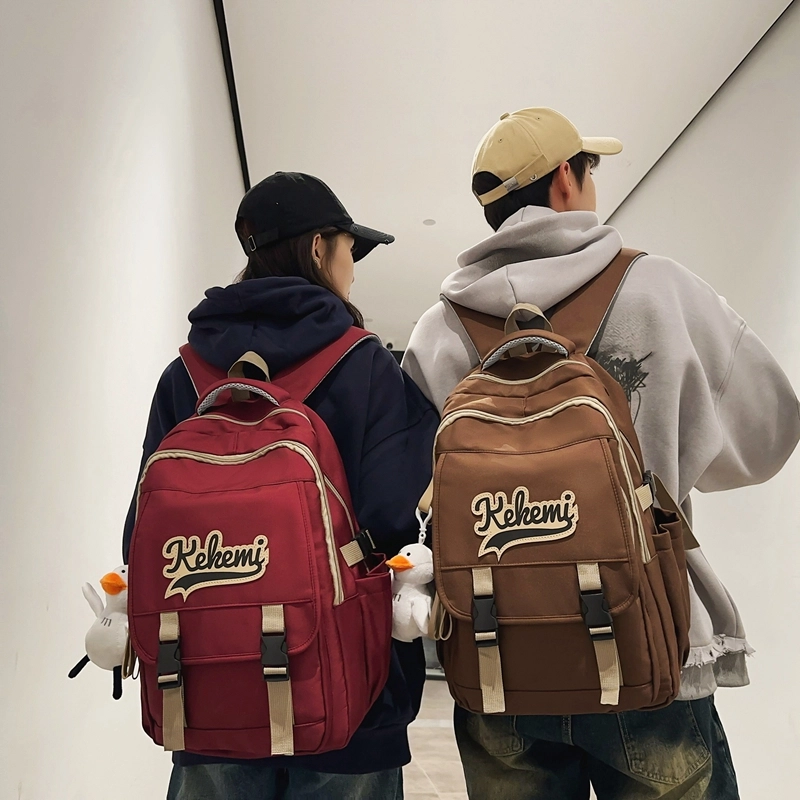 行途 初高中学生书包大容量背包潮流休闲电脑包校园百搭尼龙字母双肩包 男女同款 多色