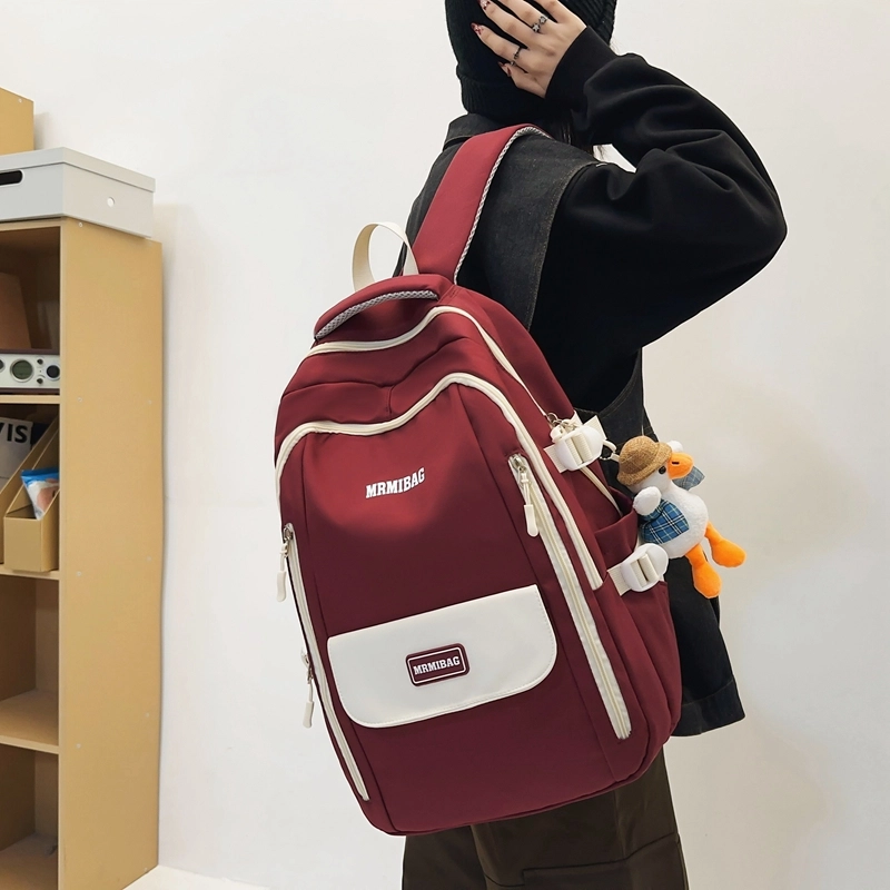 行途 韩版时尚大容量港风休闲小标校园学生 书包背包双肩包 尼龙 男女同款情侣款 多色