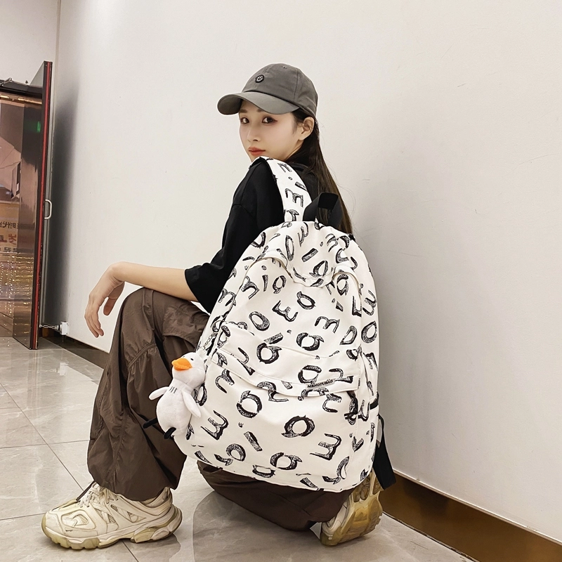 行途 书包大容量高颜值简约小众涂鸦 尼龙 双肩包 男女同款情侣款 多色