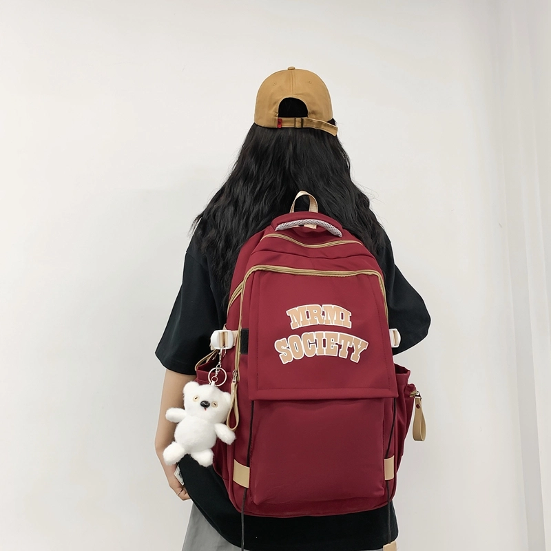 行途 大容量美式简约休闲 尼龙 背包双肩包 常规 男女同款情侣款 黑色/白色/蓝色/紫色/红色