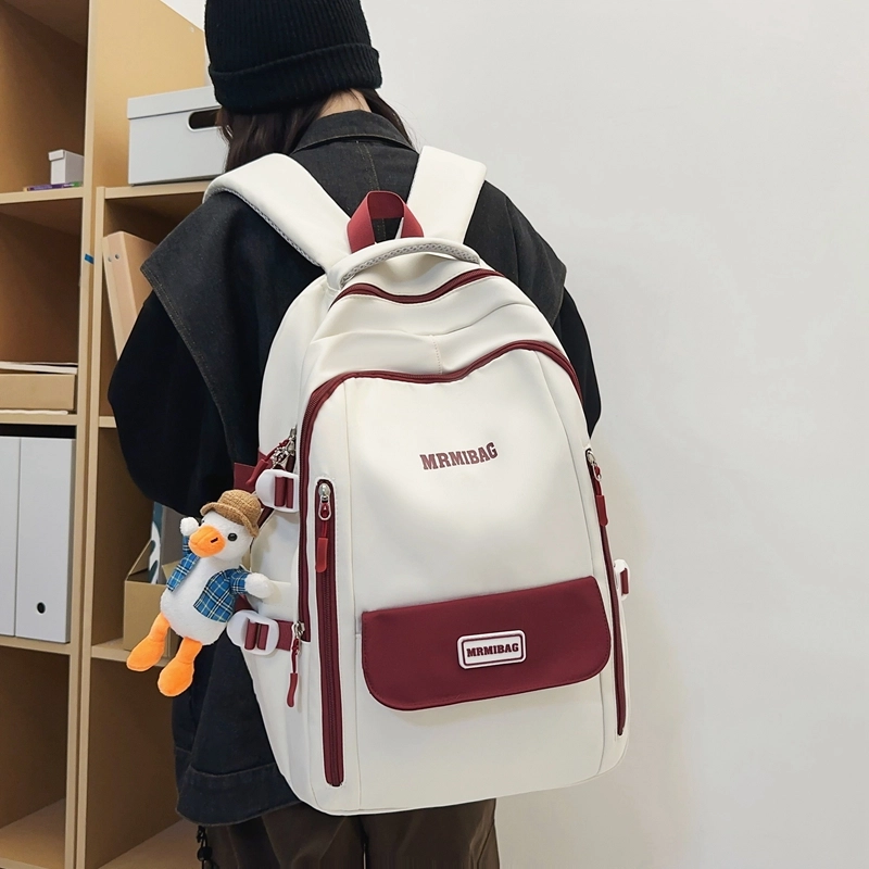 行途 韩版时尚大容量港风休闲小标校园学生 书包背包双肩包 尼龙 男女同款情侣款 多色