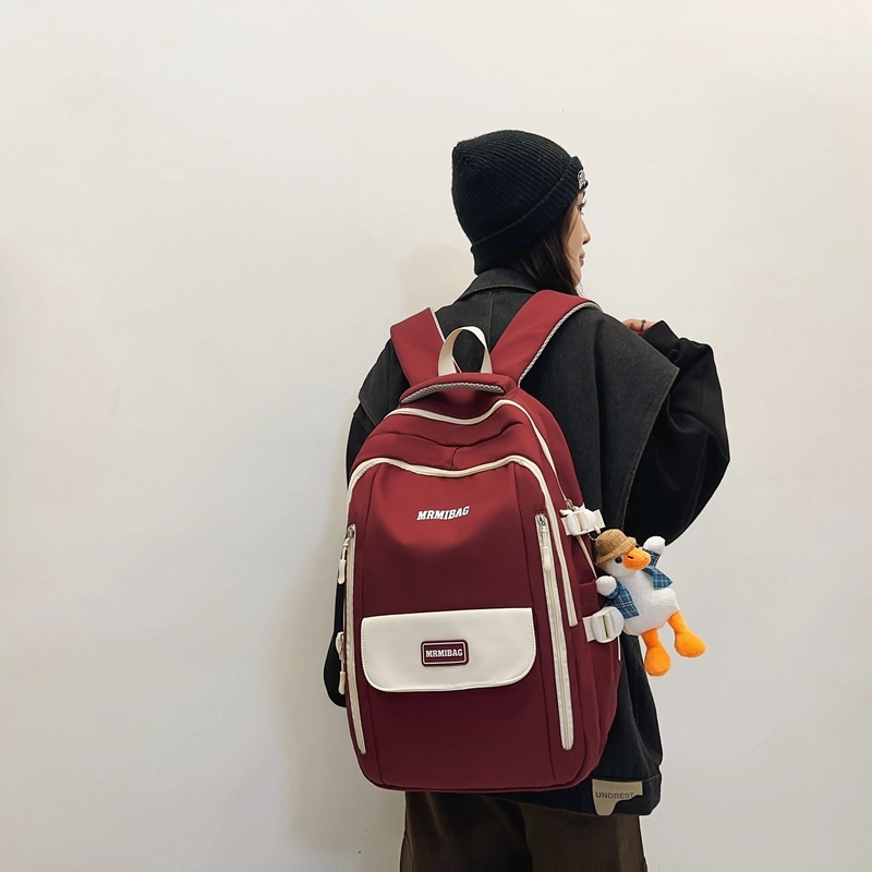 行途 韩版时尚大容量港风休闲小标校园学生 书包背包双肩包 尼龙 男女同款情侣款 多色