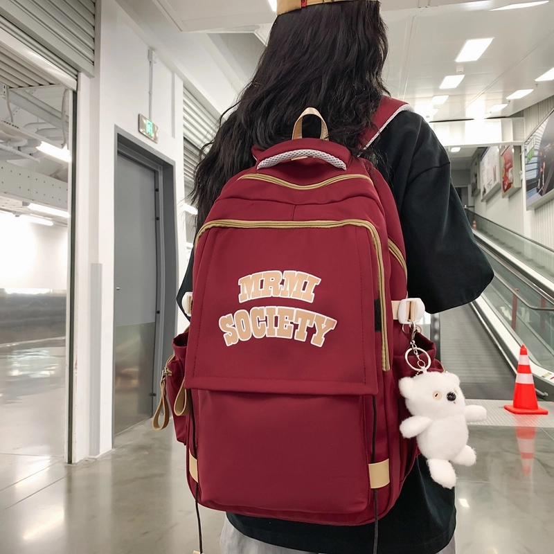行途 大容量美式简约休闲 尼龙 背包双肩包 常规 男女同款情侣款 黑色/白色/蓝色/紫色/红色