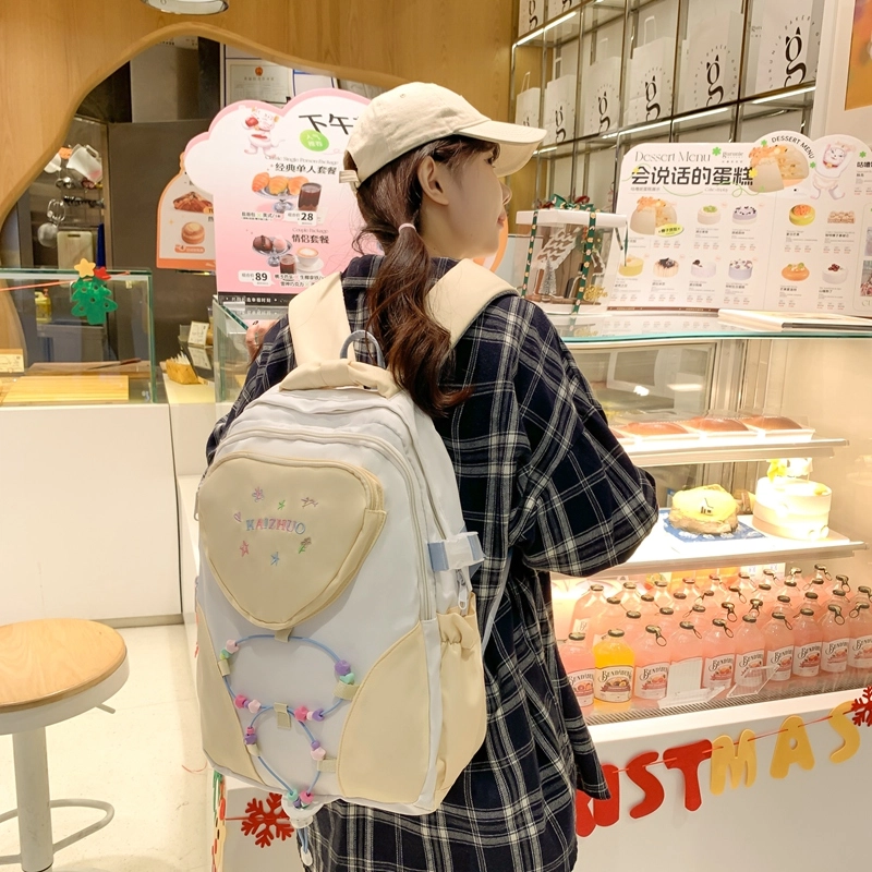 行途 书包可爱爱心大容量休闲百搭背包 尼龙 双肩包 常规 男女同款情侣款 粉色/白色