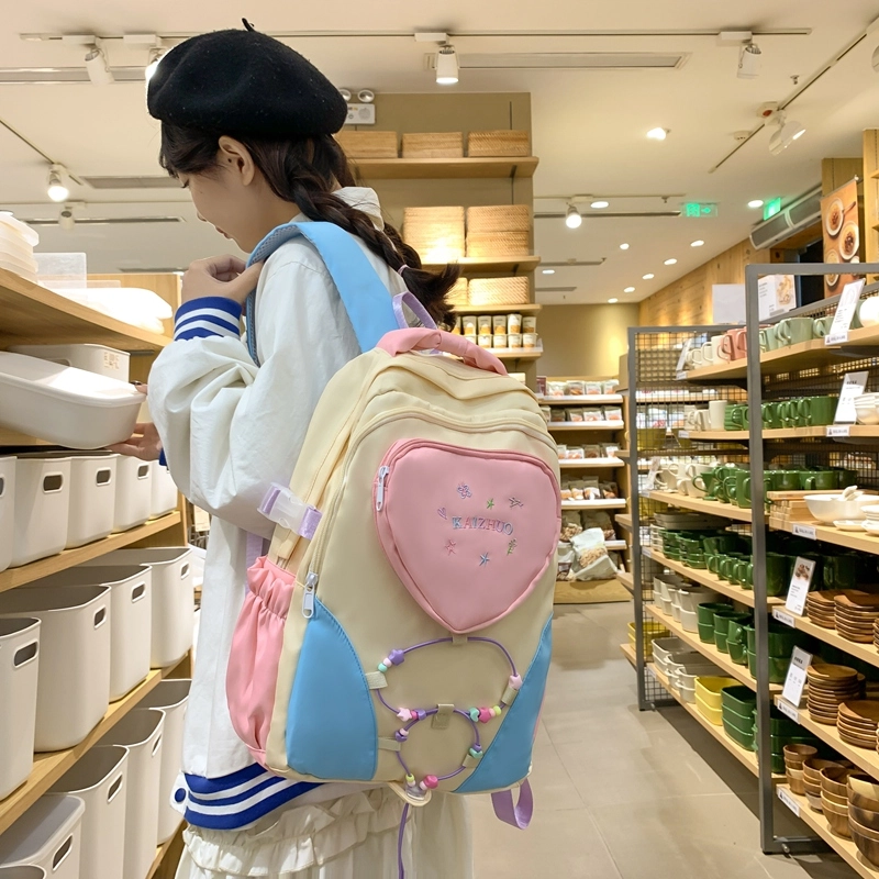 行途 书包可爱爱心大容量休闲百搭背包 尼龙 双肩包 常规 男女同款情侣款 粉色/白色