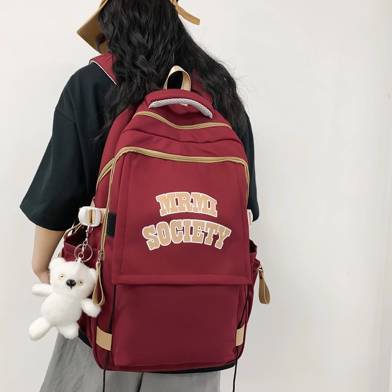 行途 大容量美式简约休闲 尼龙 背包双肩包 常规 男女同款情侣款 黑色/白色/蓝色/紫色/红色