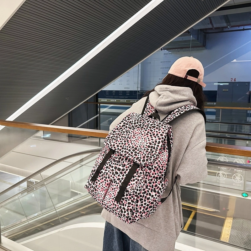 行途 韩版时尚休闲大容量校园日系翻盖豹纹 尼龙 双肩包 常规 男女同款情侣款 白色/蓝色/粉色
