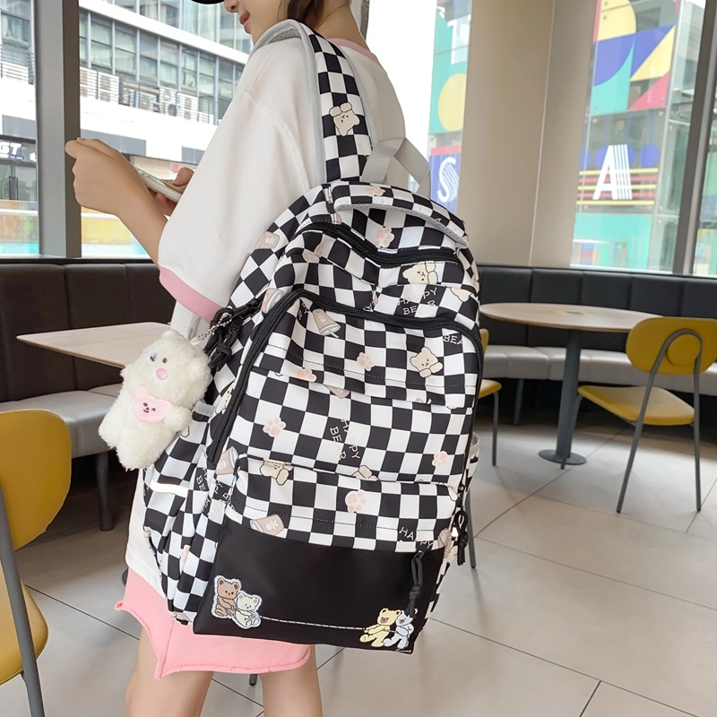 行途 学院风书包时尚格子简约背包大容量初中生休闲百搭双肩包女 尼龙