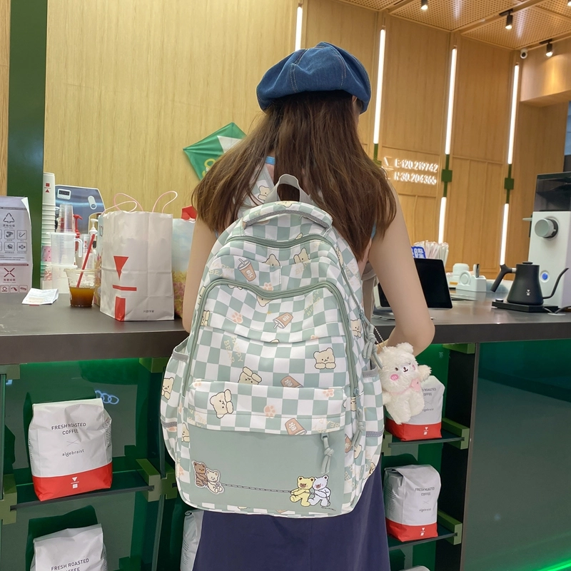 行途 学院风书包时尚格子简约背包大容量初中生休闲百搭双肩包女 尼龙