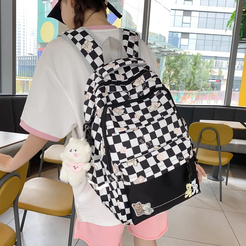 行途 学院风书包时尚格子简约背包大容量初中生休闲百搭双肩包女 尼龙