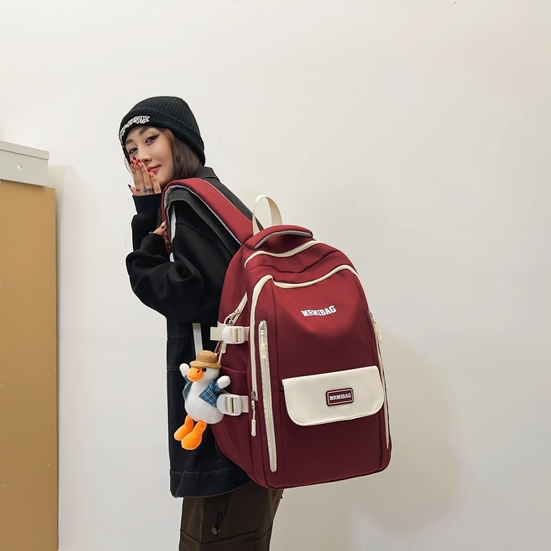 行途 韩版时尚大容量港风休闲小标校园学生 书包背包双肩包 尼龙 男女同款情侣款 多色