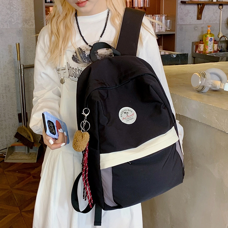 泰格奴 撞色系轻便百搭背包美版洋气个性气质高级感潮流时尚初中高中大学生上课书包 尼龙布 双肩包 男女同款情侣款 白色/湖蓝色/黑色
