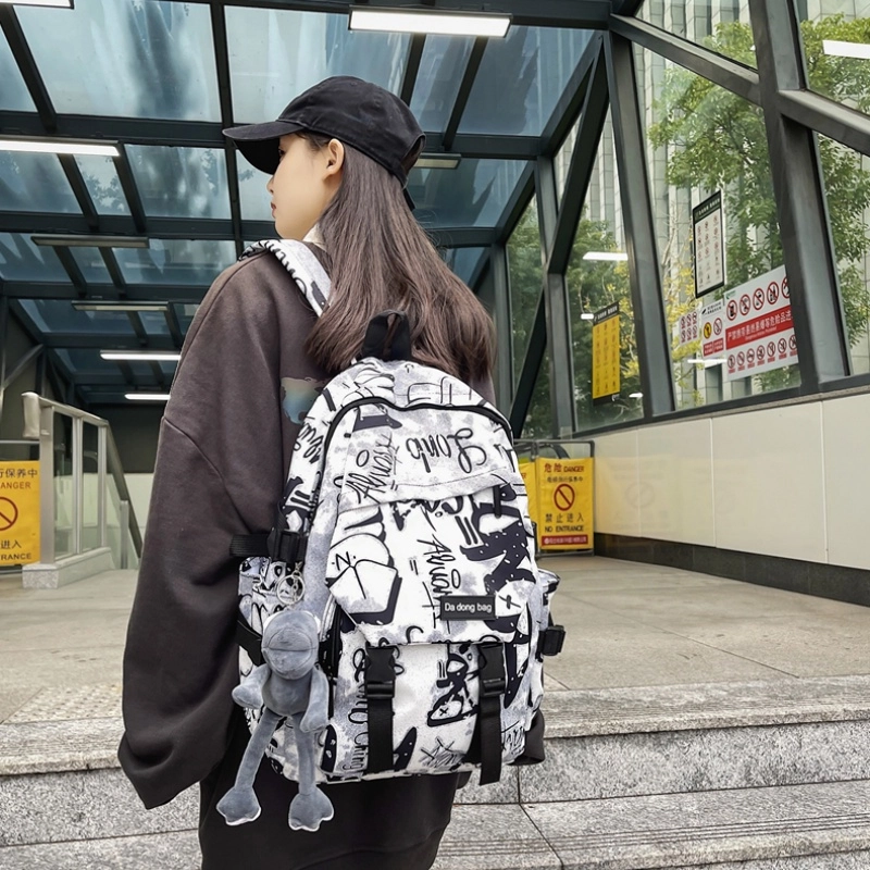 泰格奴 字母印花轻便简约国风大容量运动耐磨背包初中生高中生大学生上课百搭书包 尼龙 双肩包 男女同款情侣款 黑色/灰色/蓝色