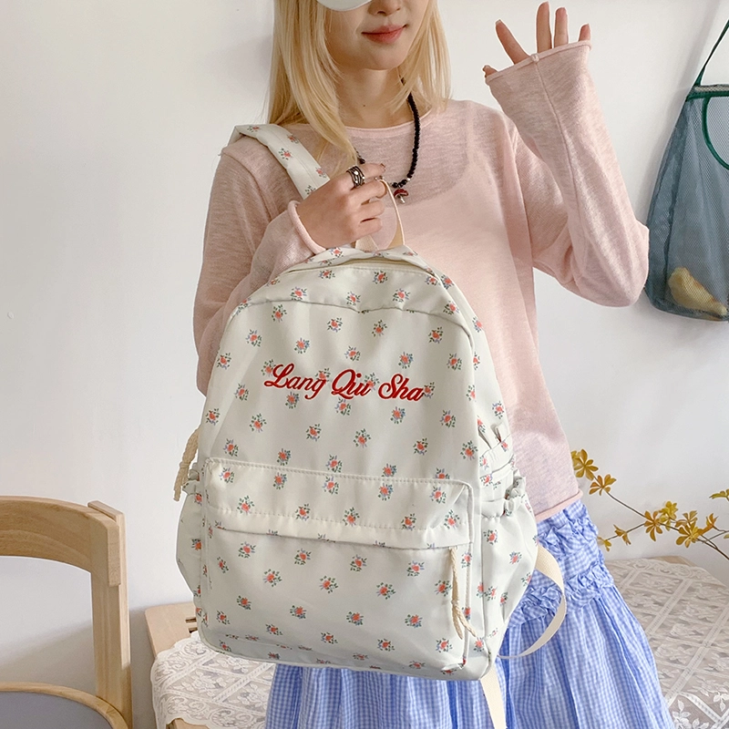泰格奴 小清新休闲高颜值精美潮版韩版背包初中生高中生大学生上课百搭书包 尼龙布 双肩包 男女同款情侣款 黑色/红色