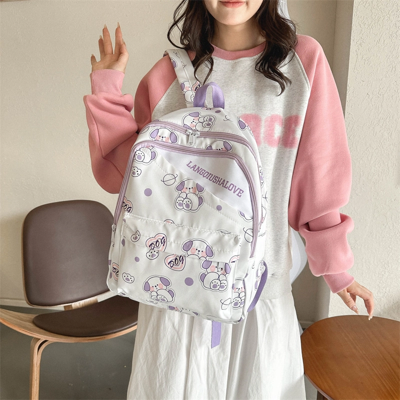 泰格奴 涂鸦精美通勤旅行小清新轻便高颜值大容量背包初中高中大学生上课百搭书包 牛津布 双肩包 女款 紫罗兰/湖蓝色/黄色/棕色