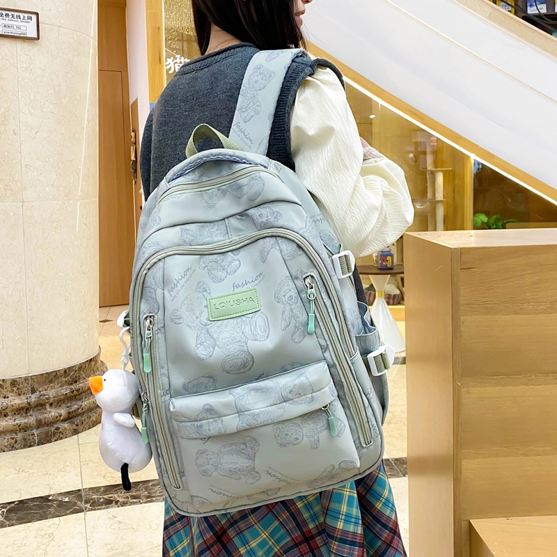 泰格奴 印花轻便简约大容量运动耐磨背包初中生高中生大学生上课百搭书包 尼龙 双肩包 男女同款情侣款 米白色/黑色/紫色/绿色
