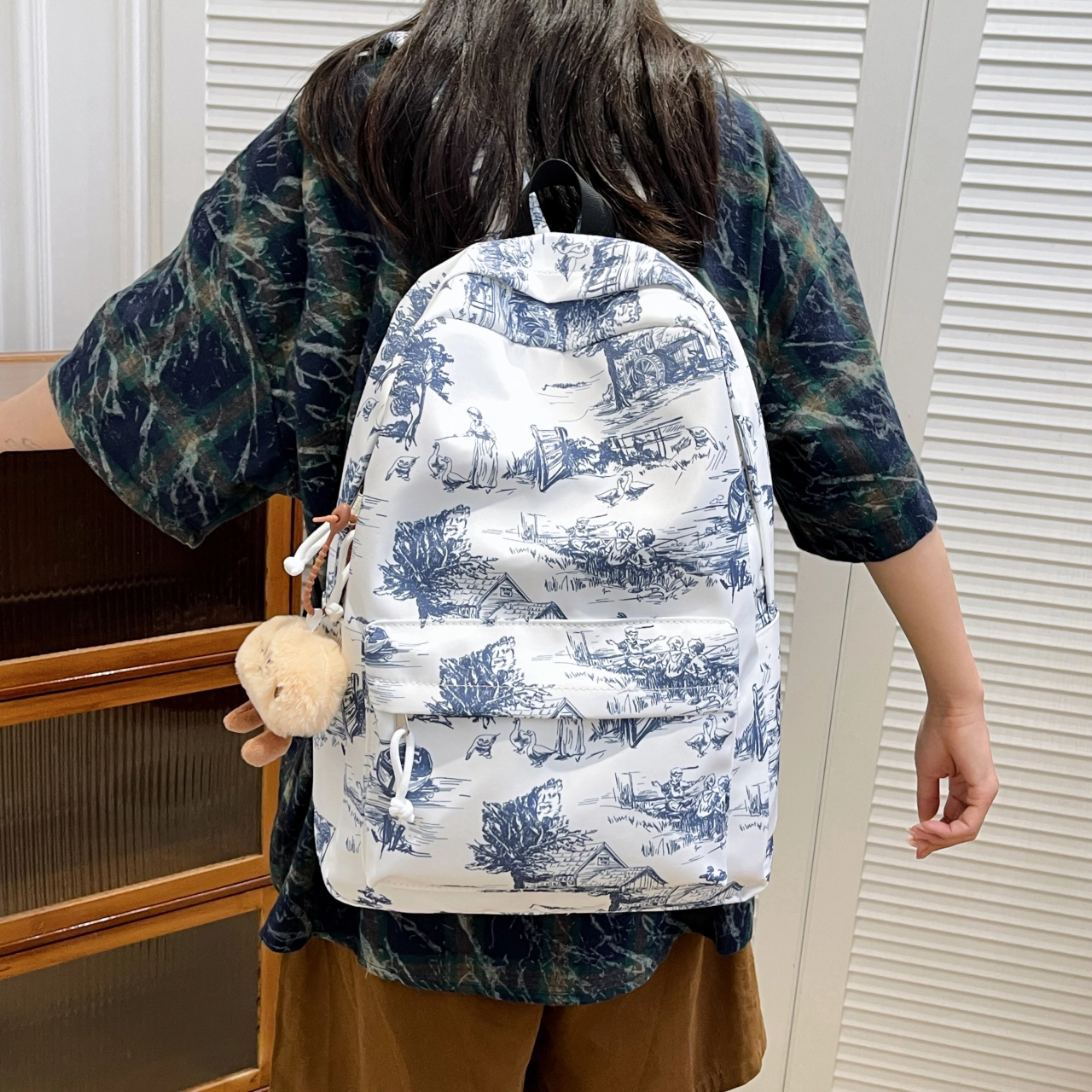 泰格奴 小清新休闲高颜值韩版背包初中生高中生大学生上课百搭书包 尼龙 双肩包 男女同款情侣款 白色/蓝色/黑色