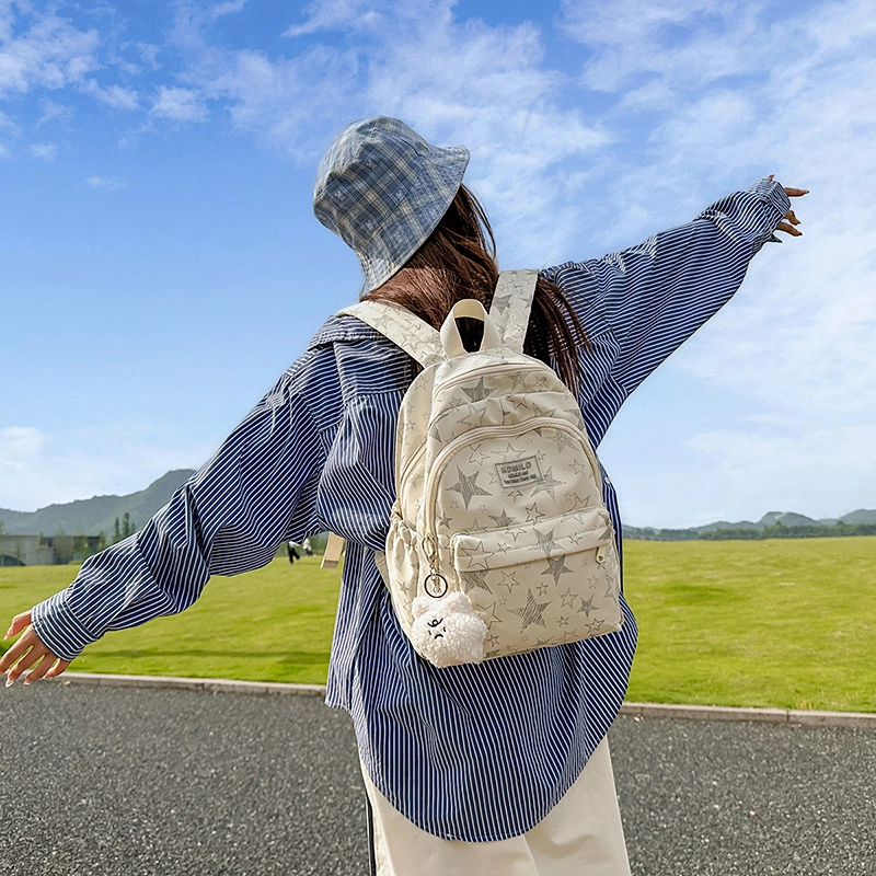 泰格奴 星星涂鸦精美机能通勤旅行小清新轻便高颜值背包初高中大学上课百搭 尼龙 双肩包 大号 男女同款情侣款 米色/黑色/白色