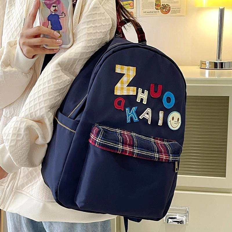 泰格奴 字母印花轻便简约国风大容量运动耐磨背包初中生高中生大学生上课百搭书包 尼龙 双肩包 女款 白色绿色黄色蓝色
