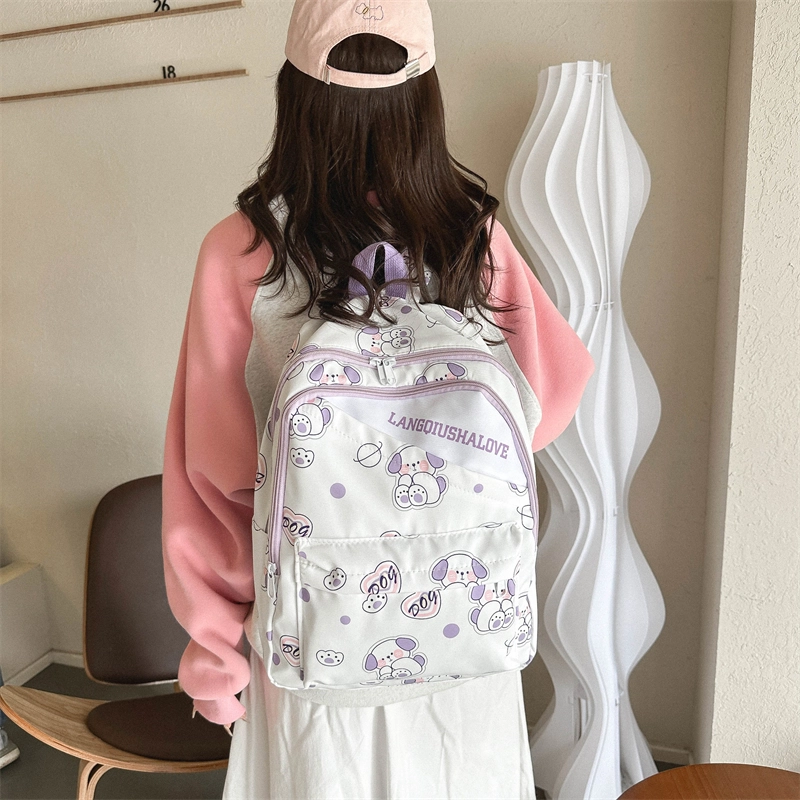 泰格奴 涂鸦精美通勤旅行小清新轻便高颜值大容量背包初中高中大学生上课百搭书包 牛津布 双肩包 女款 紫罗兰/湖蓝色/黄色/棕色