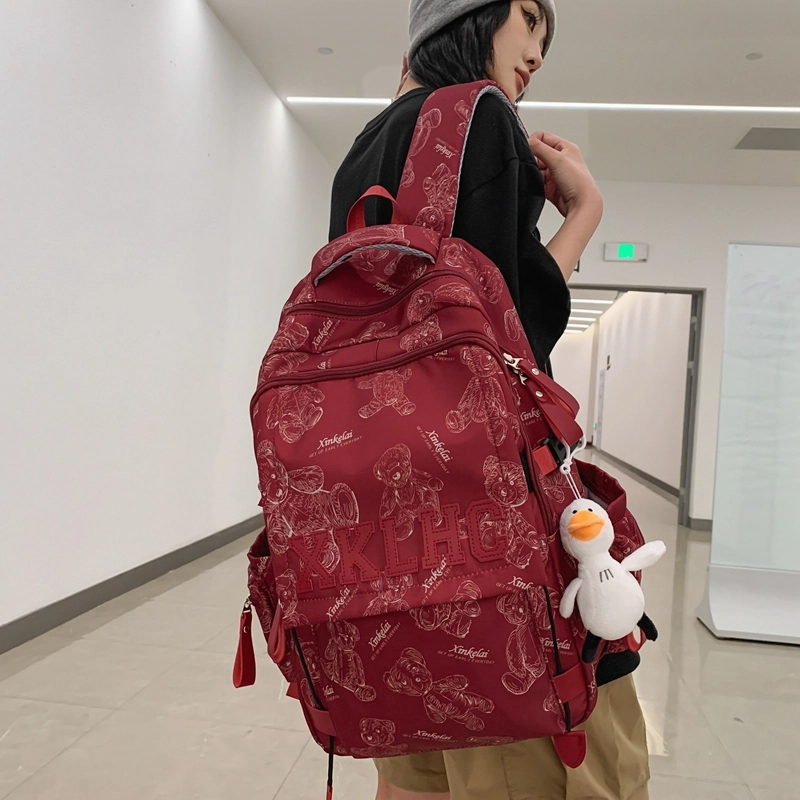泰格奴 字母印花轻便国风大容量运动背包初中生高中生大学生上课百搭书包 尼龙 双肩包 男女同款情侣款 米白色/黑色/红色/绿色