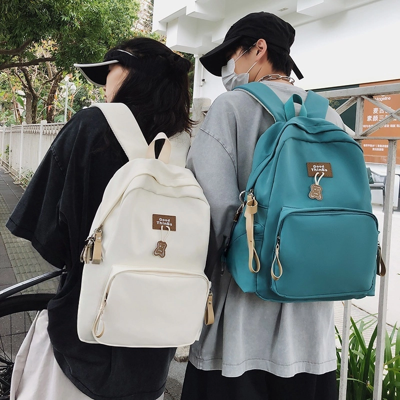 泰格奴 工装机能百搭个性运动街头旅行大容量背包初高中生大学生上课书包 尼龙 双肩包 男女同款情侣款 白色/黑色/卡其色/孔雀蓝